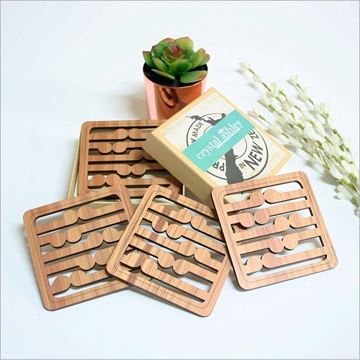 Picture of Rimu coasters koru